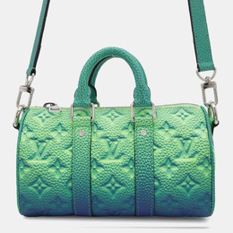 Louis Vuitton: Зелёная сумка  Keepall