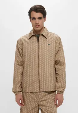 Lacoste: Бежевая рубашка 