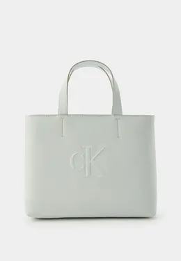 Calvin Klein Jeans: Серая сумка 