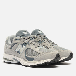 New Balance: Серые кроссовки 