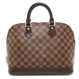 Louis Vuitton: Коричневая сумка 
