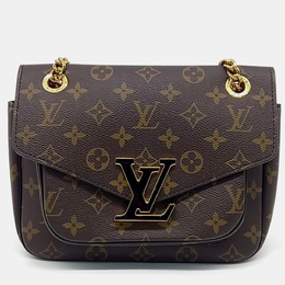 Louis Vuitton: Коричневая сумка 