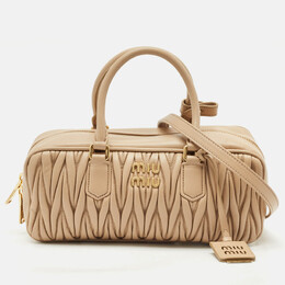 Miu Miu: Бежевая сумка 