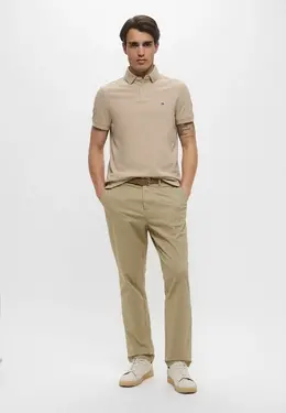 Tommy Hilfiger: Бежевое поло 