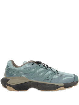 Salomon: Зелёные кроссовки 