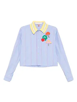 Mira Mikati: Голубая рубашка 