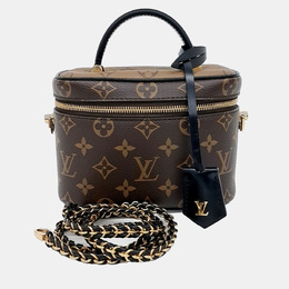 Louis Vuitton: Коричневая сумка 