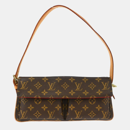 Louis Vuitton: Коричневая сумка 
