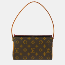 Louis Vuitton: Коричневая сумка 