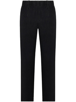 Homme Plissé Issey Miyake: Чёрные брюки 