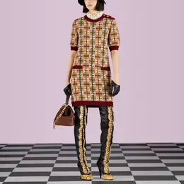 Gucci: Коричневое платье 