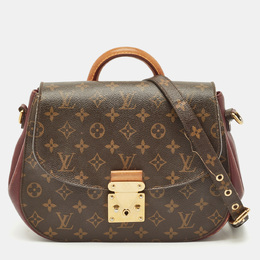 Louis Vuitton: Коричневая сумка 