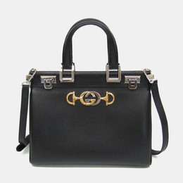Gucci: Чёрная сумка  Zumi