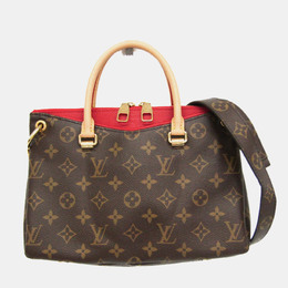 Louis Vuitton: Коричневая сумка 