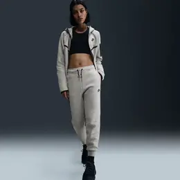 Nike: Флисовые брюки 