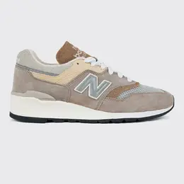 New Balance: Серые кроссовки 