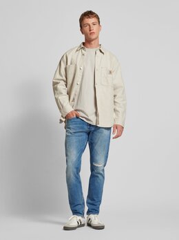 Tommy Jeans: Зауженные джинсы 