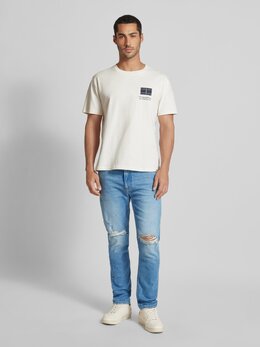 Tommy Jeans: Зауженные джинсы 