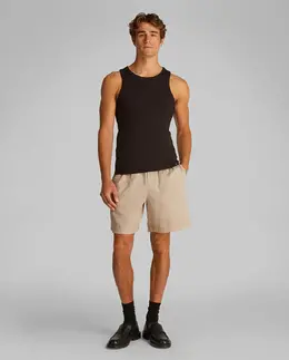 Calvin Klein Jeans: Бежевые шорты 