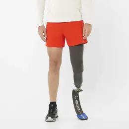Salomon: Оранжевые шорты 