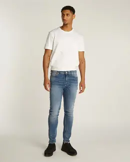 Tommy Jeans: Синие джинсы  Simon