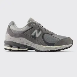 New Balance: Серые кроссовки 