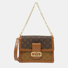 Louis Vuitton: Коричневая сумка 
