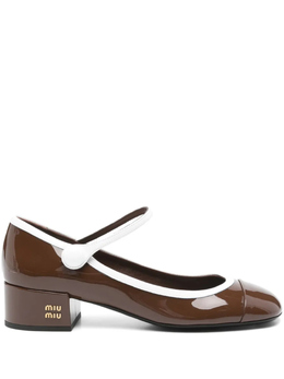 Miu Miu: Двухцветные туфли 