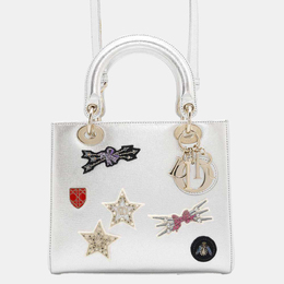 Dior: Серебристая сумка 