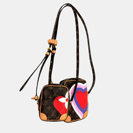 Louis Vuitton: Коричневая сумка 