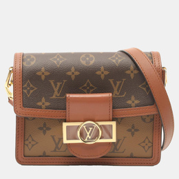 Louis Vuitton: Коричневая сумка 