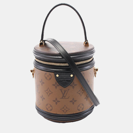 Louis Vuitton: Коричневая сумка 