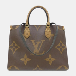 Louis Vuitton: Коричневая сумка-шоппер 