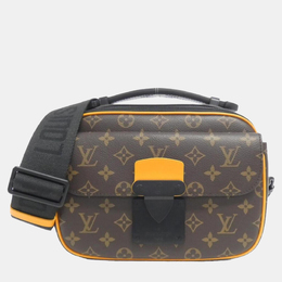 Louis Vuitton: Коричневая сумка 