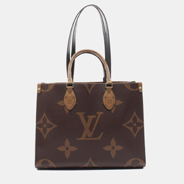 Louis Vuitton: Коричневая сумка-шоппер 