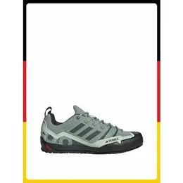 adidas: Зелёные кроссовки 