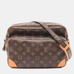 Louis Vuitton: Коричневая сумка 