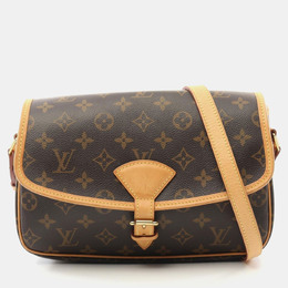 Louis Vuitton: Коричневая сумка 