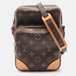 Louis Vuitton: Коричневая сумка 