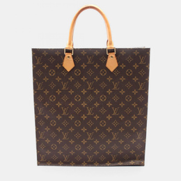 Louis Vuitton: Коричневая сумка-шоппер 