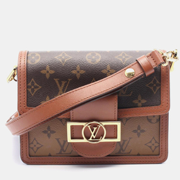 Louis Vuitton: Коричневая сумка 