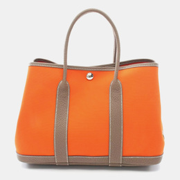 Hermes: Оранжевая сумка-шоппер 