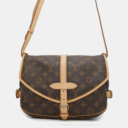 Louis Vuitton: Коричневая сумка 