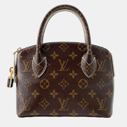 Louis Vuitton: Коричневая сумка 