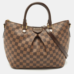 Louis Vuitton: Коричневая сумка 