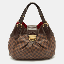 Louis Vuitton: Коричневая сумка 