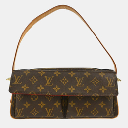 Louis Vuitton: Коричневая сумка 