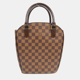 Louis Vuitton: Коричневая сумка 