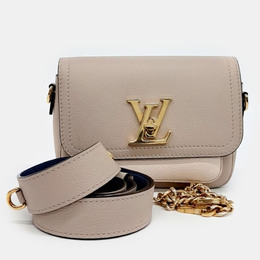 Louis Vuitton: Бежевая сумка 