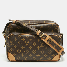 Louis Vuitton: Коричневая сумка 